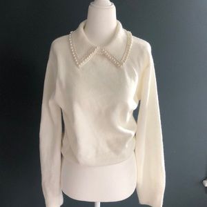 Feminine ivory sweater with pearl detailing